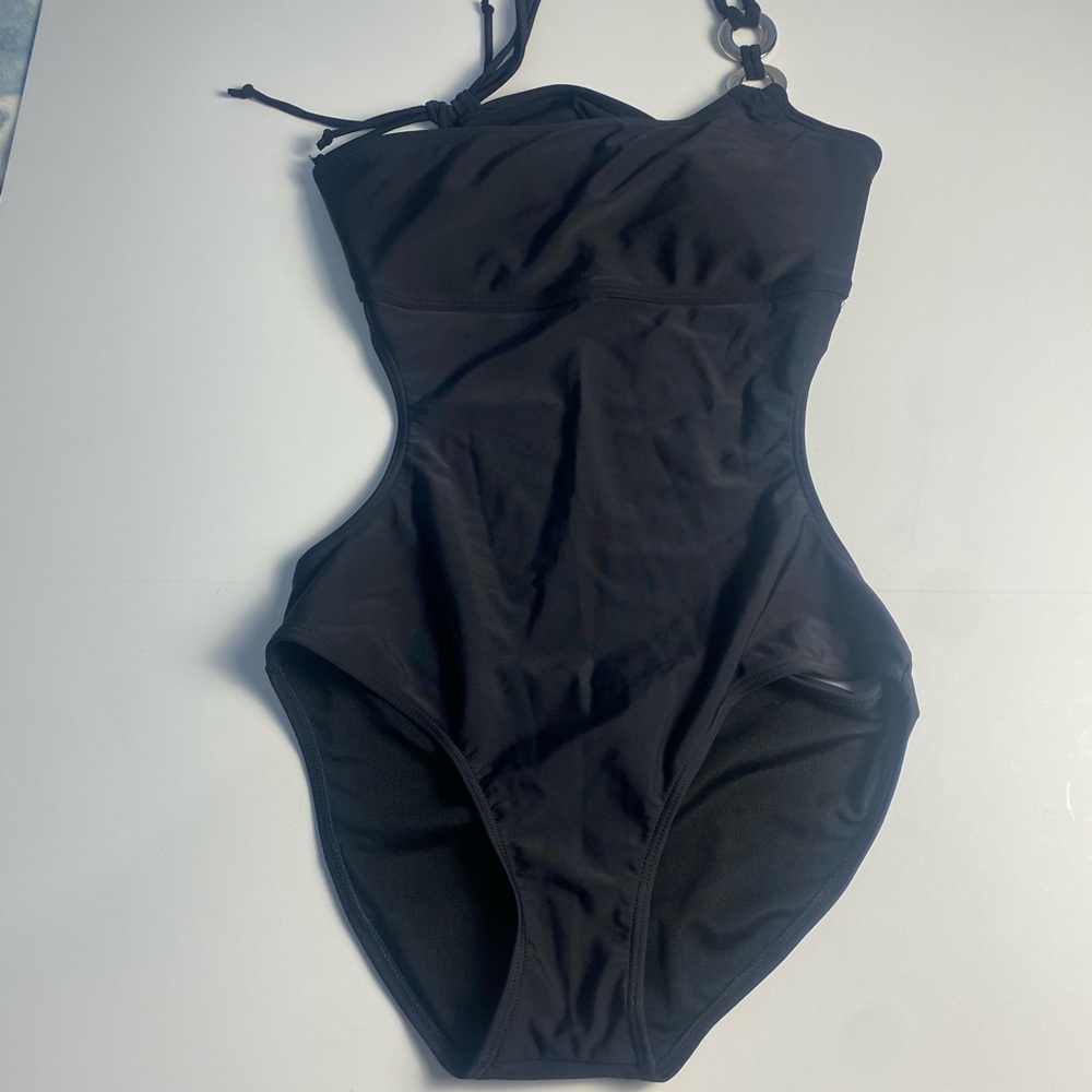 Black bathing suit. Cutout back , Bandeau top one piece one shoulder .